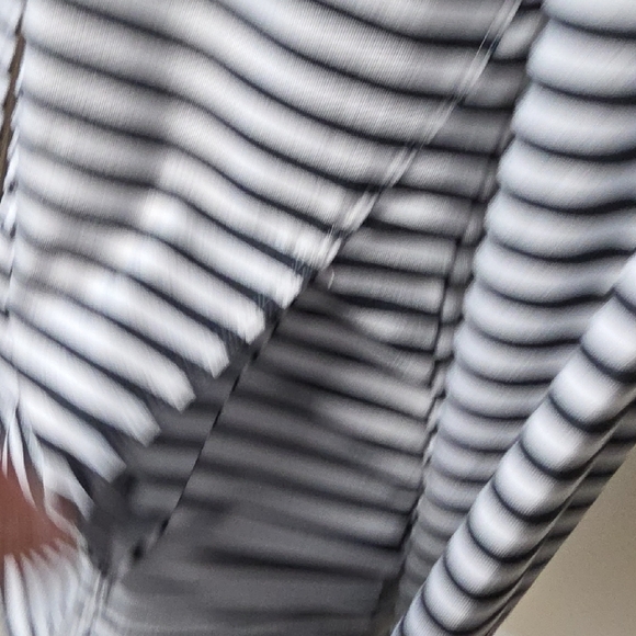 Lolë – Striped Zip-Up Jacket with High Collar - Picture 8 of 14